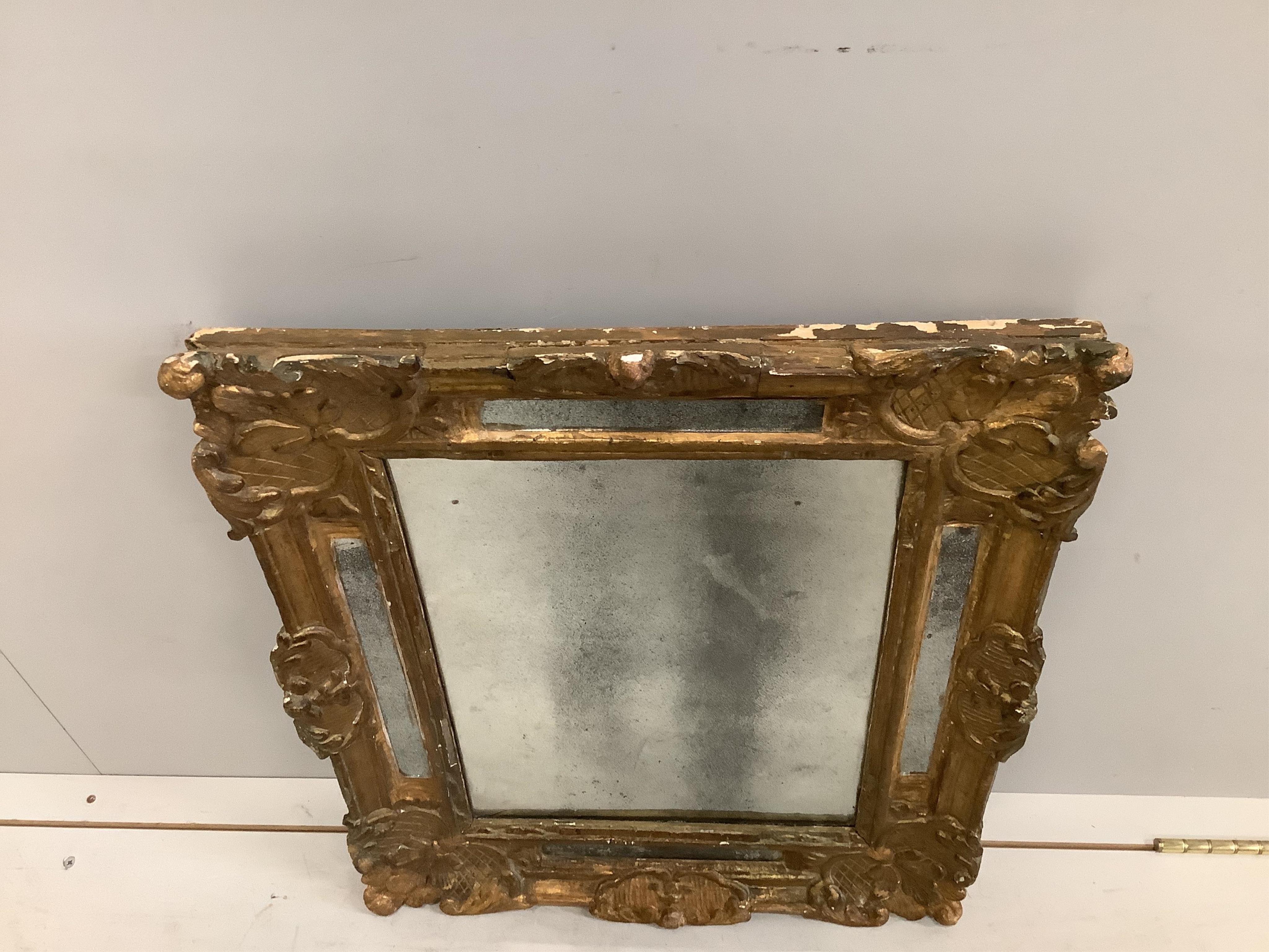 An early 19th century rectangular gilt composition marginal plate wall mirror, width 50cm, height 59cm. Condition - fair